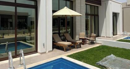 One-Bedroom Oasis with Pool View