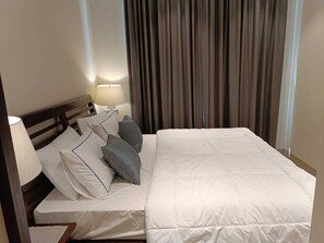 مكواة/لوح كي وملاءات أسرّة