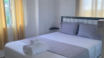 Appartement Confort, coin cuisine, vue ville | Rideaux occultants, fer et planche à repasser, Wi-Fi gratuit