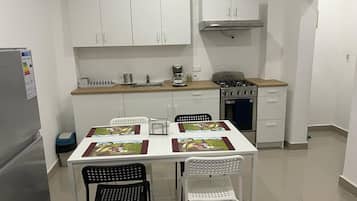 Departamento familiar, vista a la ciudad | Cocina privada
