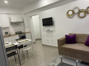 Family Apartment, City View | Private kitchen - Plata View Apartahotel (Monte Plata)