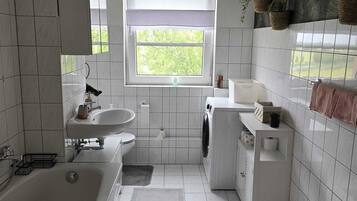 Hair dryer, towels, toilet paper