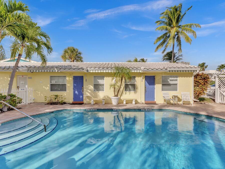 Outdoor pool, open 7:00 AM to 9:00 PM, pool umbrellas, pool loungers