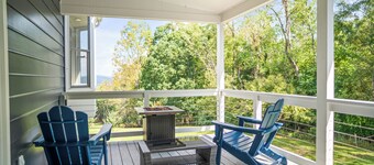 The Blue Ridge Cottage is a second floor room steps from the Main Inn. It has its own private deck and entrance which offer wooded and valley views. This cottage has a private 4 person Sundance Spa tub, and an outdoor propane fire pit. It features a