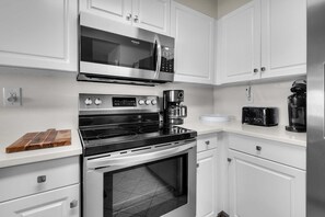 Condo, 1 King Bed with Sofa bed (Pelican Isle 117) | Private kitchen | Oven, toaster