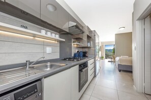 Fridge, microwave, oven, stovetop - Morningside Hideaway: Chic Meets Modern Comfort (Sandton)