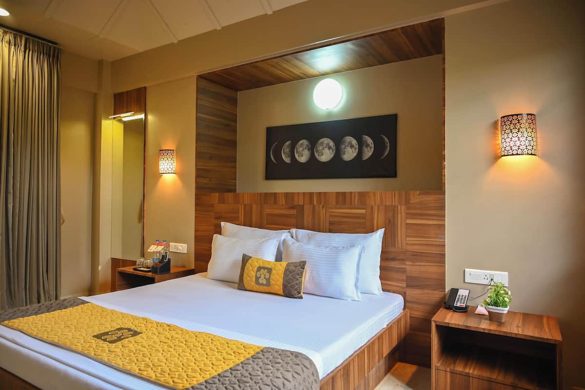 Premium bedding, memory-foam beds, minibar, in-room safe