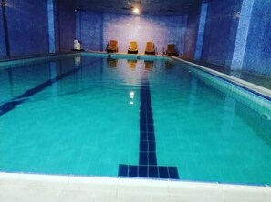 Indoor pool, sun loungers