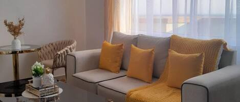 Deluxe Apartment, Balcony, City View | Living area | 32-inch Smart TV with digital channels