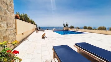 2 outdoor pools, pool umbrellas, sun loungers