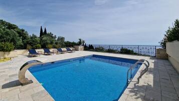 2 outdoor pools, pool umbrellas, sun loungers