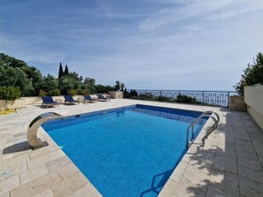 2 outdoor pools, pool umbrellas, sun loungers