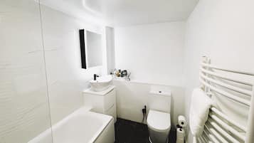 Hair dryer, towels, soap, shampoo