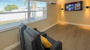 Estudio Deluxe (Parrot) | Área de sala de estar