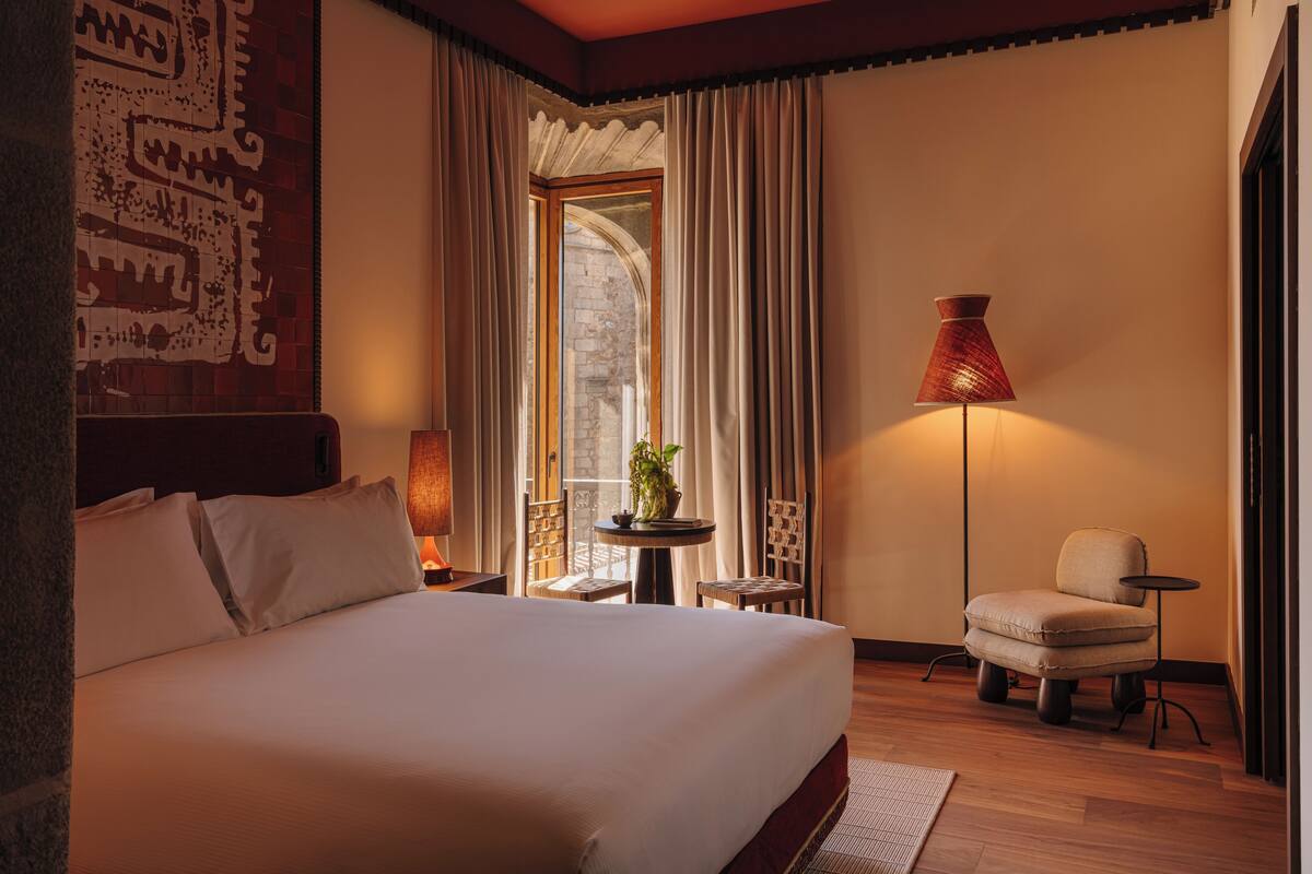 Suite, 1 King Bed, Balcony (Godoy) | Down duvets, minibar, in-room safe, soundproofing