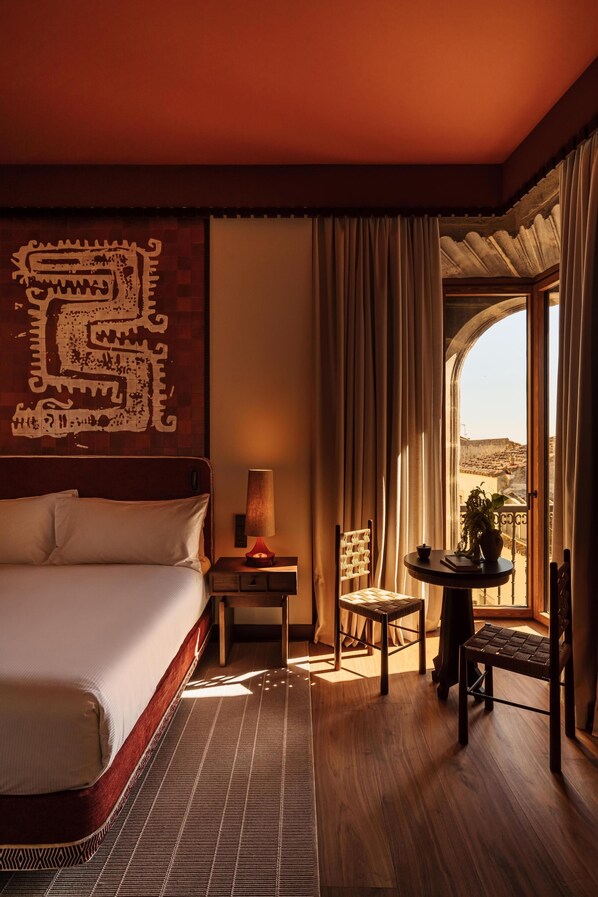 Suite, 1 King Bed, Balcony (Godoy) | Down comforters, minibar, in-room safe, soundproofing