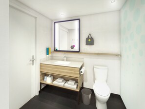 Un baño moderno con un lavamanos blanco, tocador de madera, espejo con marco morado, inodoro y un bote de basura.