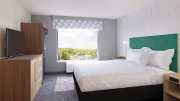 Ein modernes Hotelzimmer mit einem großen Bett, einem Fernseher auf einer Holzkommode und einem Fenster mit Blick auf Grünflächen.