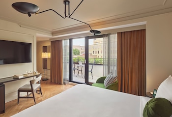 Premier Room, 1 King Bed, Patio (King) | Egyptian cotton sheets, premium bedding, down comforters, pillowtop beds at SIXTY DC