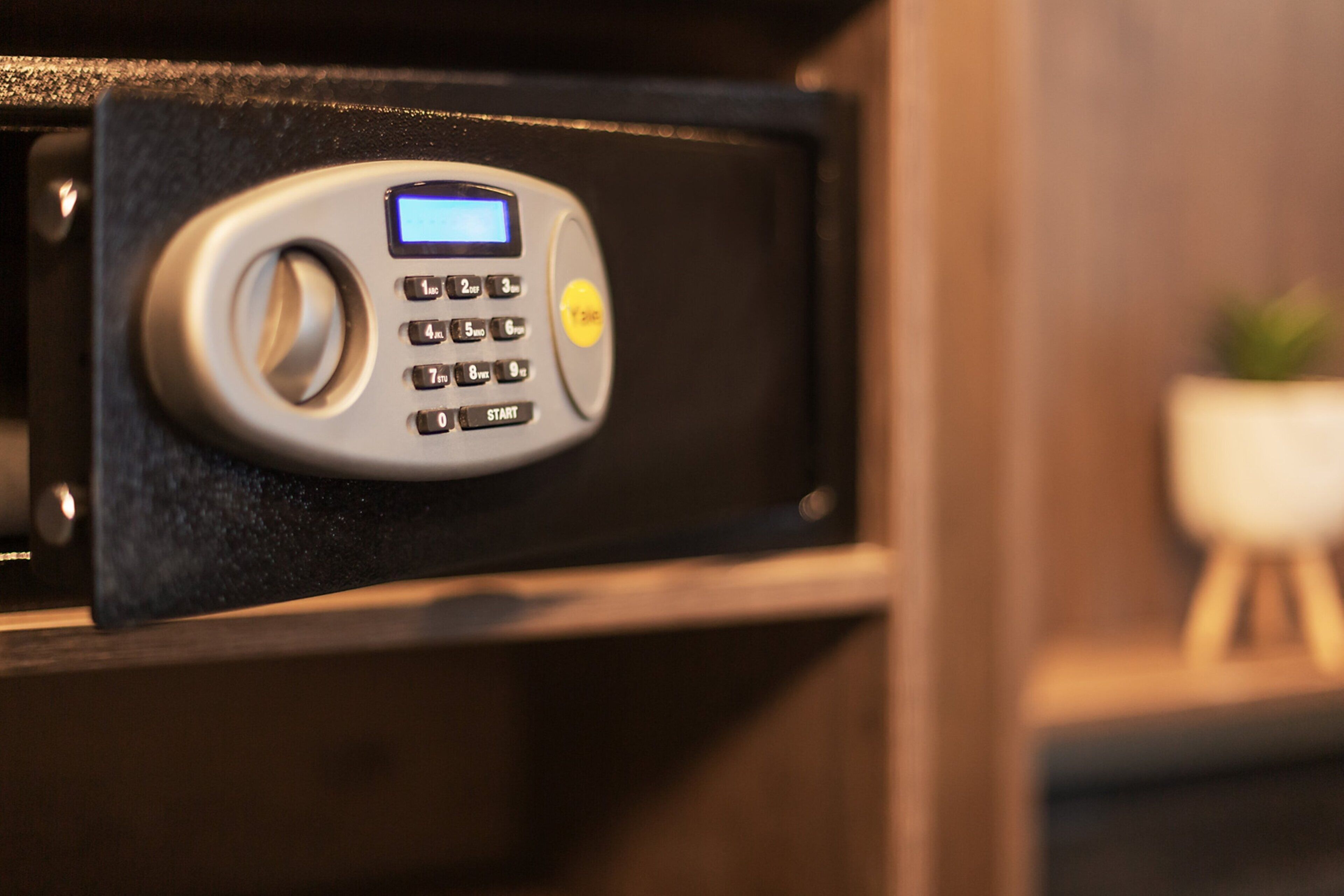 A keypad lock on a cabinet.
