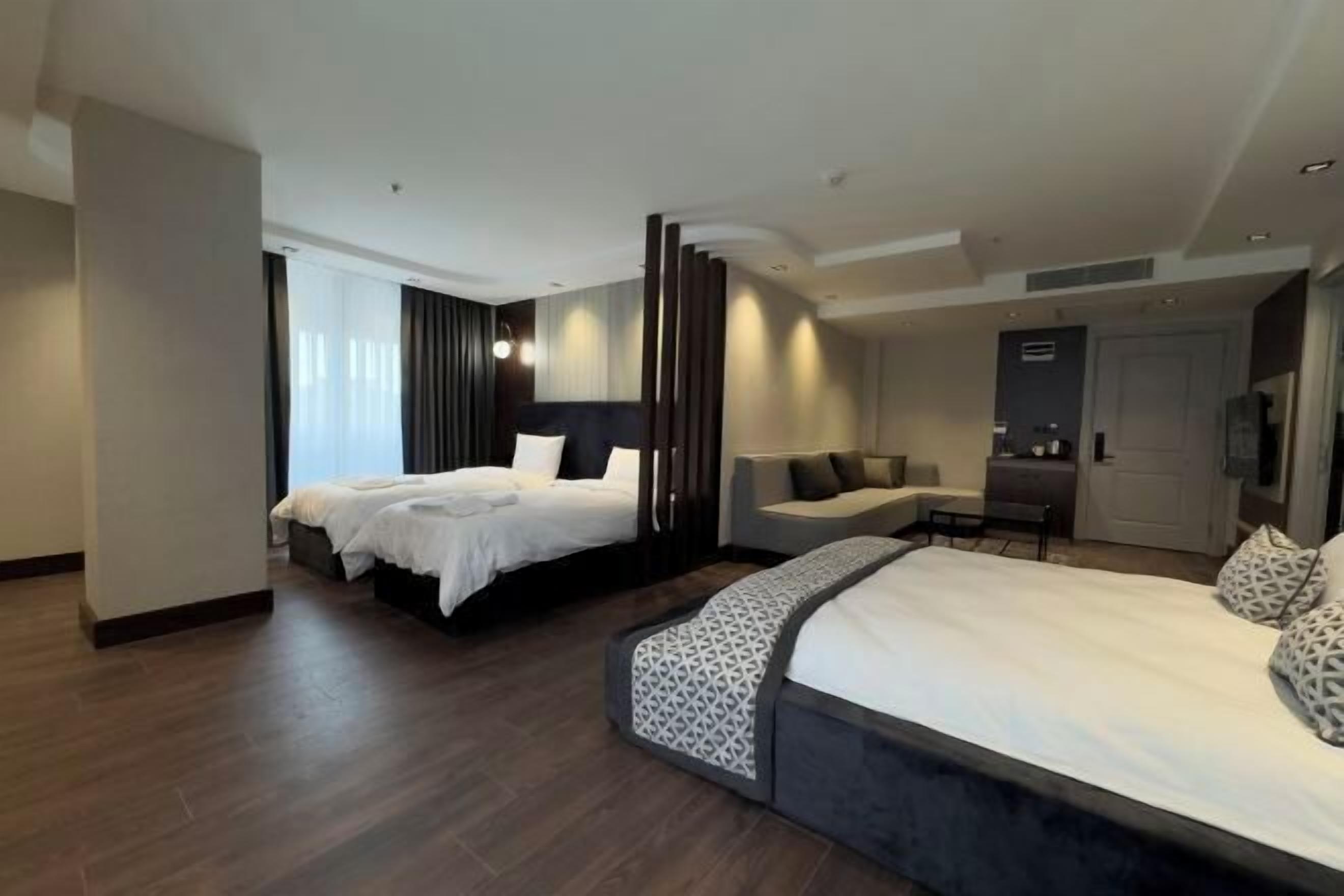 Hypo-allergenic bedding, free minibar, in-room safe, desk