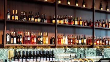 4 bars/lounges, rooftop bar