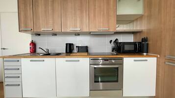 Luksusleilighet, byutsikt | Eget kjøkken | Kjøleskap, mikrobølgeovn, ovn og kokeplater