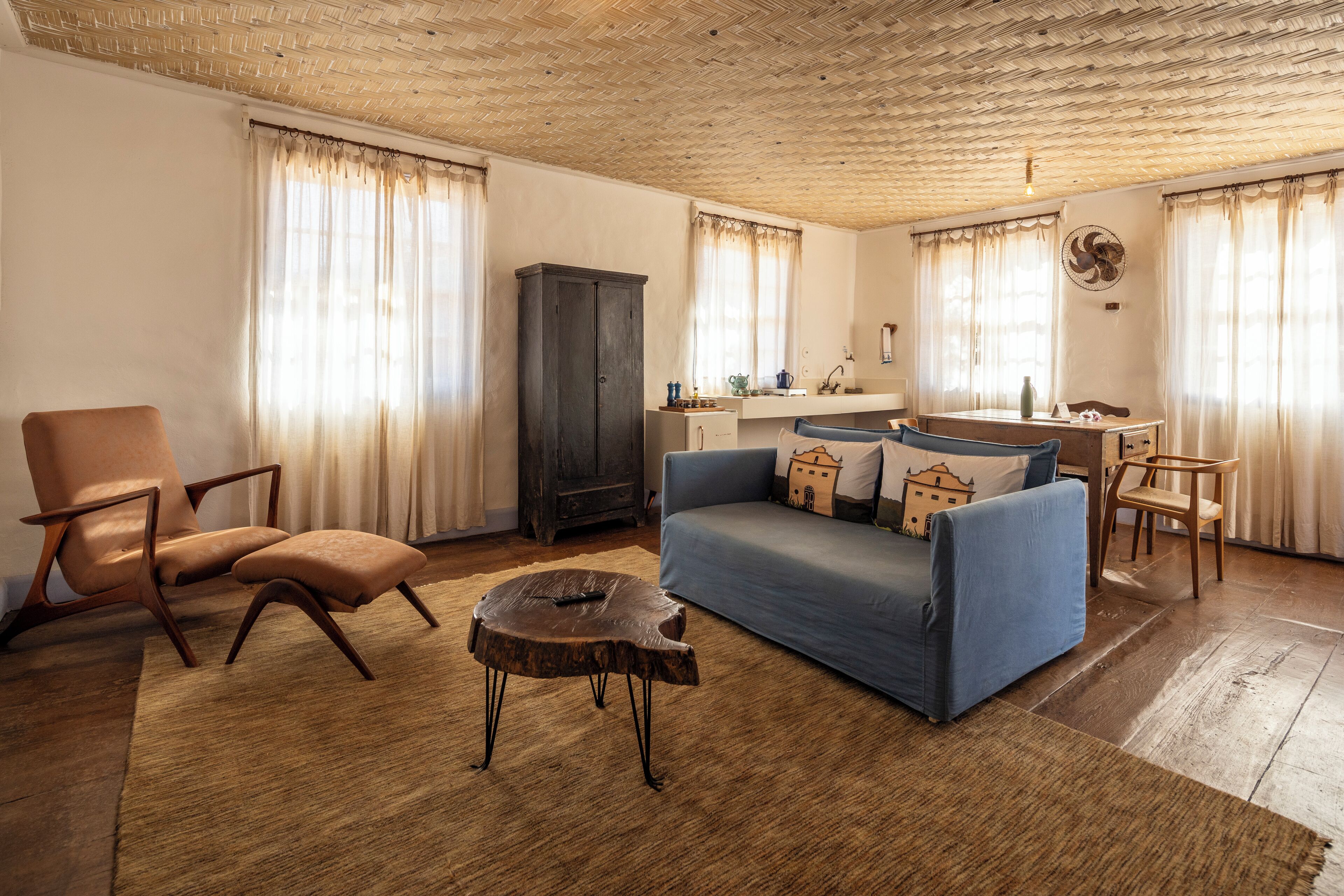 Casa superior, vista para o pátio | Área de estar