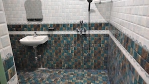 Shower, towels, soap, shampoo