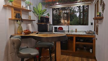 Fridge, microwave, stovetop, coffee/tea maker