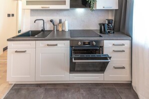 Appartement Affaires, 1 très grand lit et 1 canapé-lit, cuisine | Cuisine privée