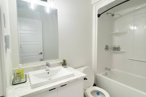 Hair dryer, towels, soap, shampoo