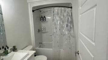Hair dryer, towels, soap, shampoo