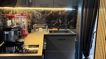 Microwave, stovetop, coffee/tea maker, electric kettle