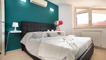 2 dormitorios, caja fuerte, wifi gratis y ropa de cama