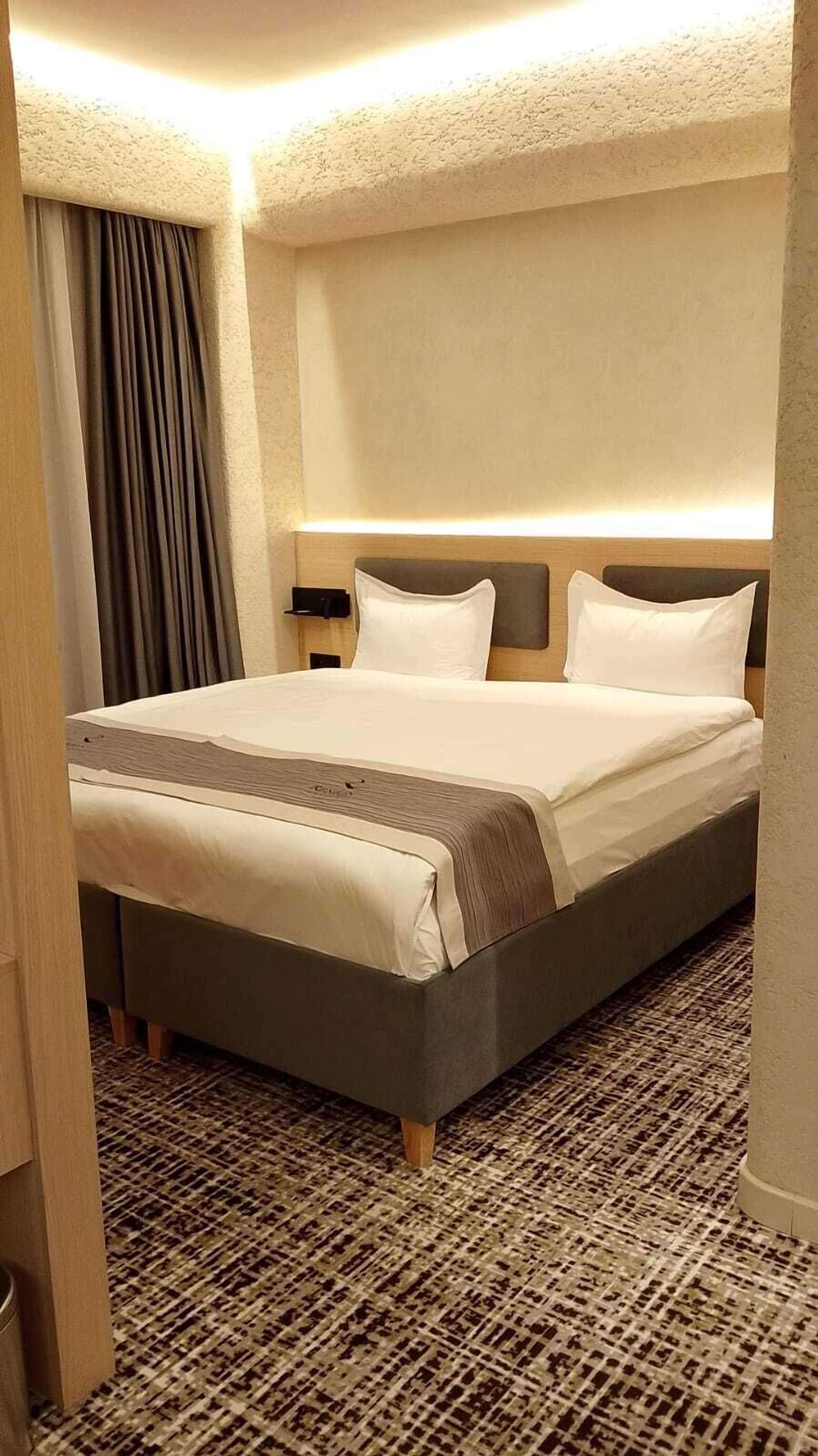 Foto - Renion Almaty Hotel