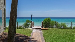 A pathway leading to a beach with a clear view of the ocean. - Blue Mountain Condos #22 (Santa Rosa Beach)