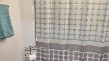 Hair dryer, towels, soap, toilet paper