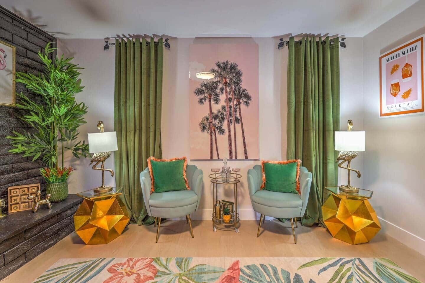 A room with two armchairs, a small round table, and a decorative lamp.