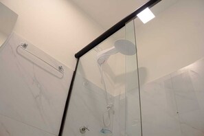 Shower, hair dryer, towels, soap