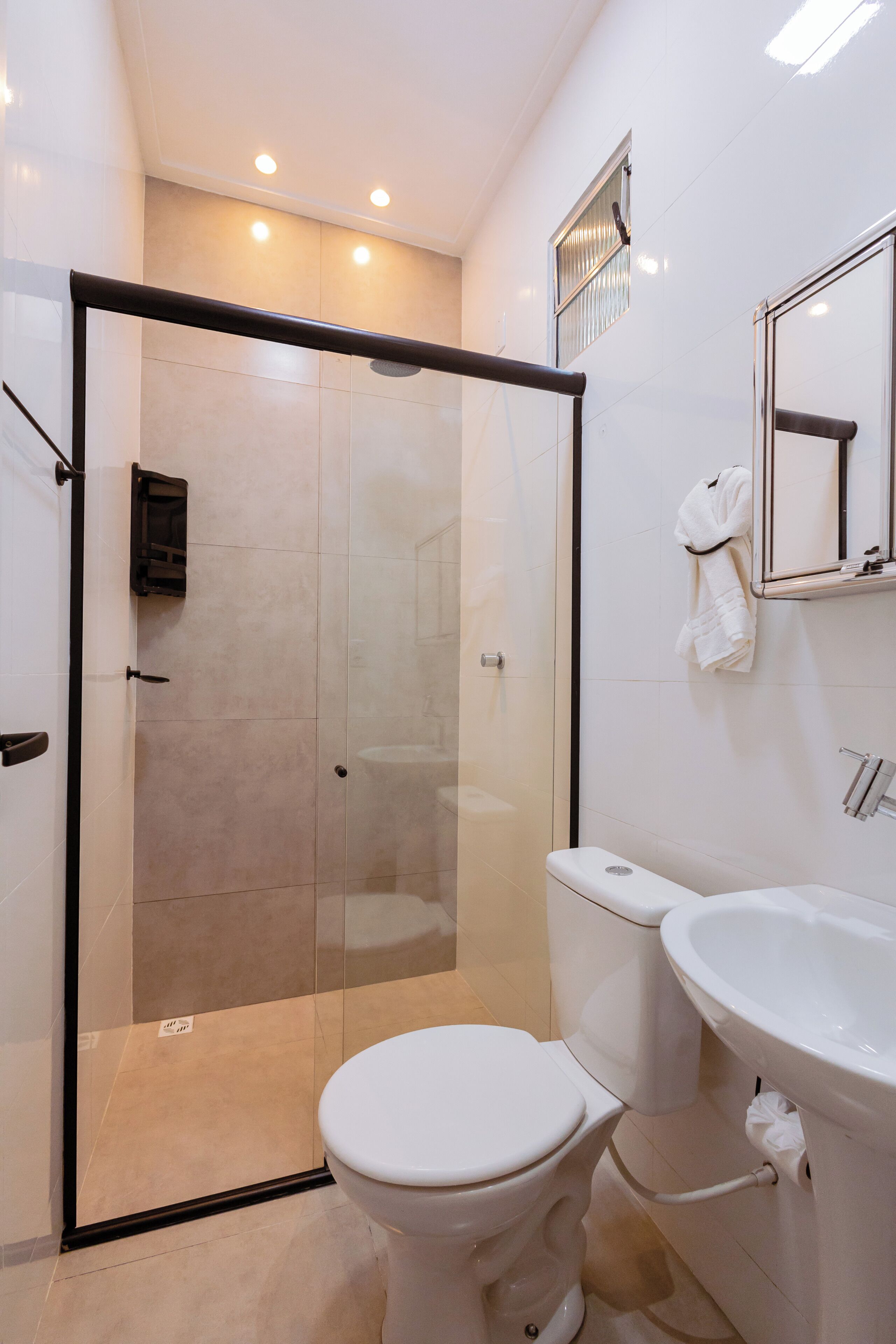 Shower, towels, soap, toilet paper