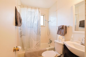 Hair dryer, towels, soap, shampoo