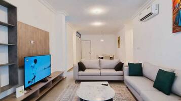 غرفة فردية بتجهيزات أساسية | منطقة المعيشة