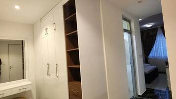 Classic Single Room, Balcony, City View | In-room safe, desk, laptop workspace, iron/ironing board