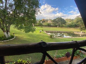 Balcony view - Laguna Lodge El Zarzal (Valle de Angeles)