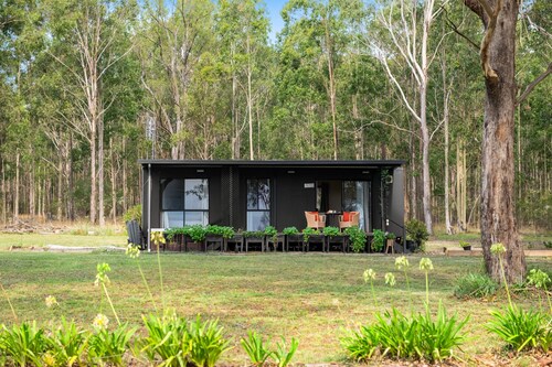 Hunter Hideaway Farm cozy cabin for two with hot tub outside the door.