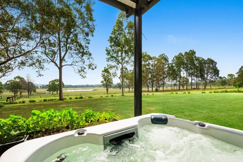 Hunter Hideaway Farm cozy cabin for two with hot tub outside the door.