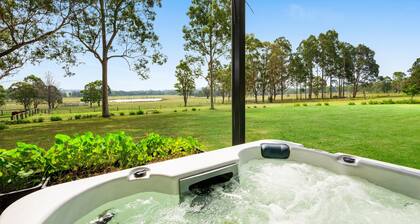 Hunter Hideaway Farm cozy cabin for two with hot tub outside the door.