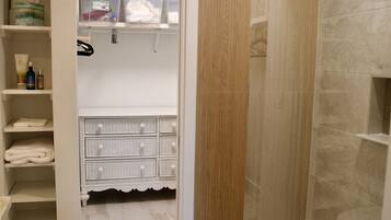Shower, hair dryer, towels, soap