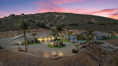 GRANDVIEW PICKLEBALL OASIS. A private 6 bedroom pool home with panoramic views.
